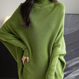 Micchiati di oversize di lana merino da donna 2025 Autunno inverno alla moda alla moda Turtleneck manica a pipistrella maglione