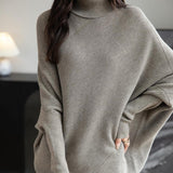 Micchiati di oversize di lana merino da donna 2025 Autunno inverno alla moda alla moda Turtleneck manica a pipistrella maglione