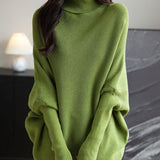 Micchiati di oversize di lana merino da donna 2025 Autunno inverno alla moda alla moda Turtleneck manica a pipistrella maglione