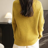 Suéter 100% lã merino waffle tricotado com gola redonda