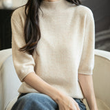 100% 메리노 울 반소매 모크넥 심리스 스웨터
