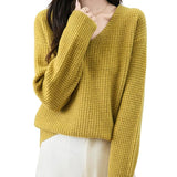 Suéter de malha waffle 100% lã Merino com decote em V