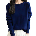 Woman wearing a lightweight 100% merino wool navy blue crewneck sweater