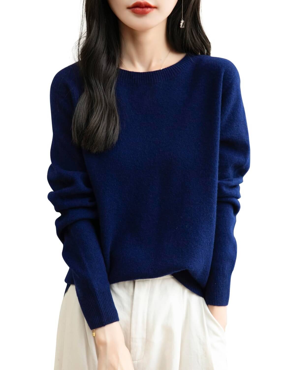 Woman wearing a lightweight 100% merino wool navy blue crewneck sweater