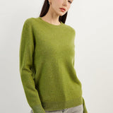 Women's grass green cashmere crew neck sweater, front angled view