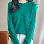 women's green merino wool crewneck cardigan sweater front view
