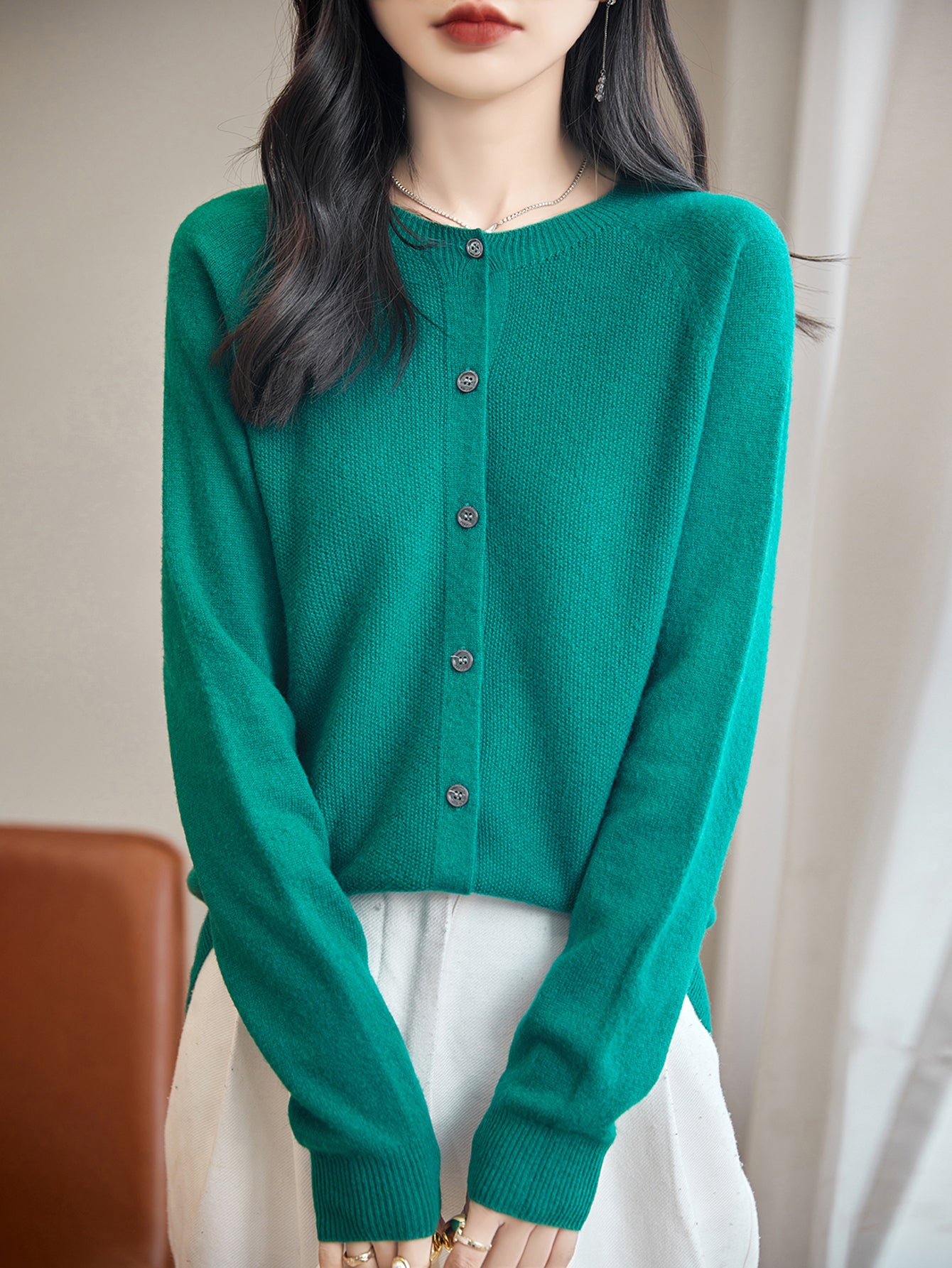 women's green merino wool crewneck cardigan sweater front view