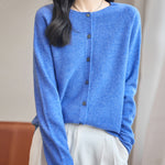 womens blue merino wool crewneck cardigan sweater front view