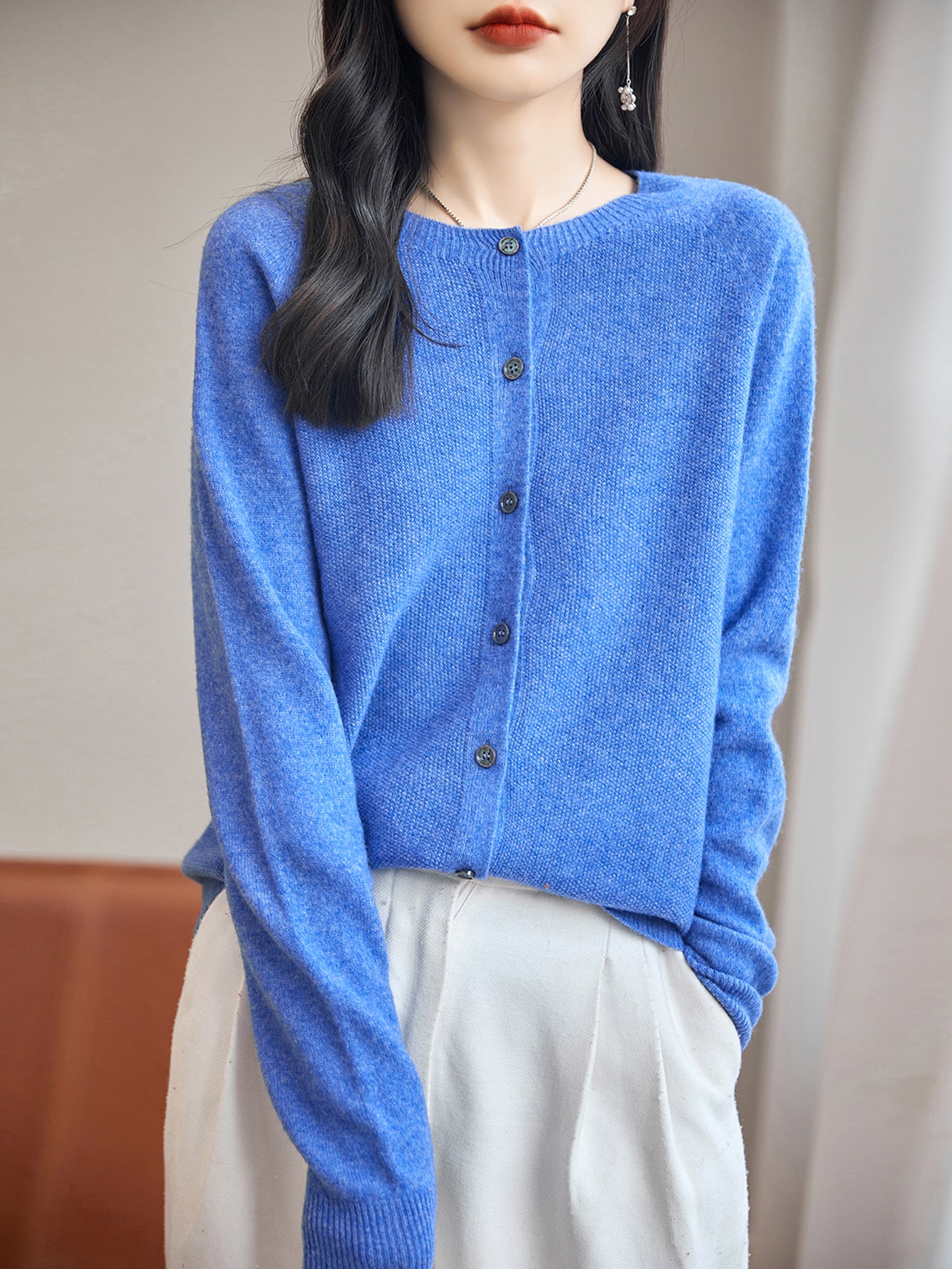 womens blue merino wool crewneck cardigan sweater front view